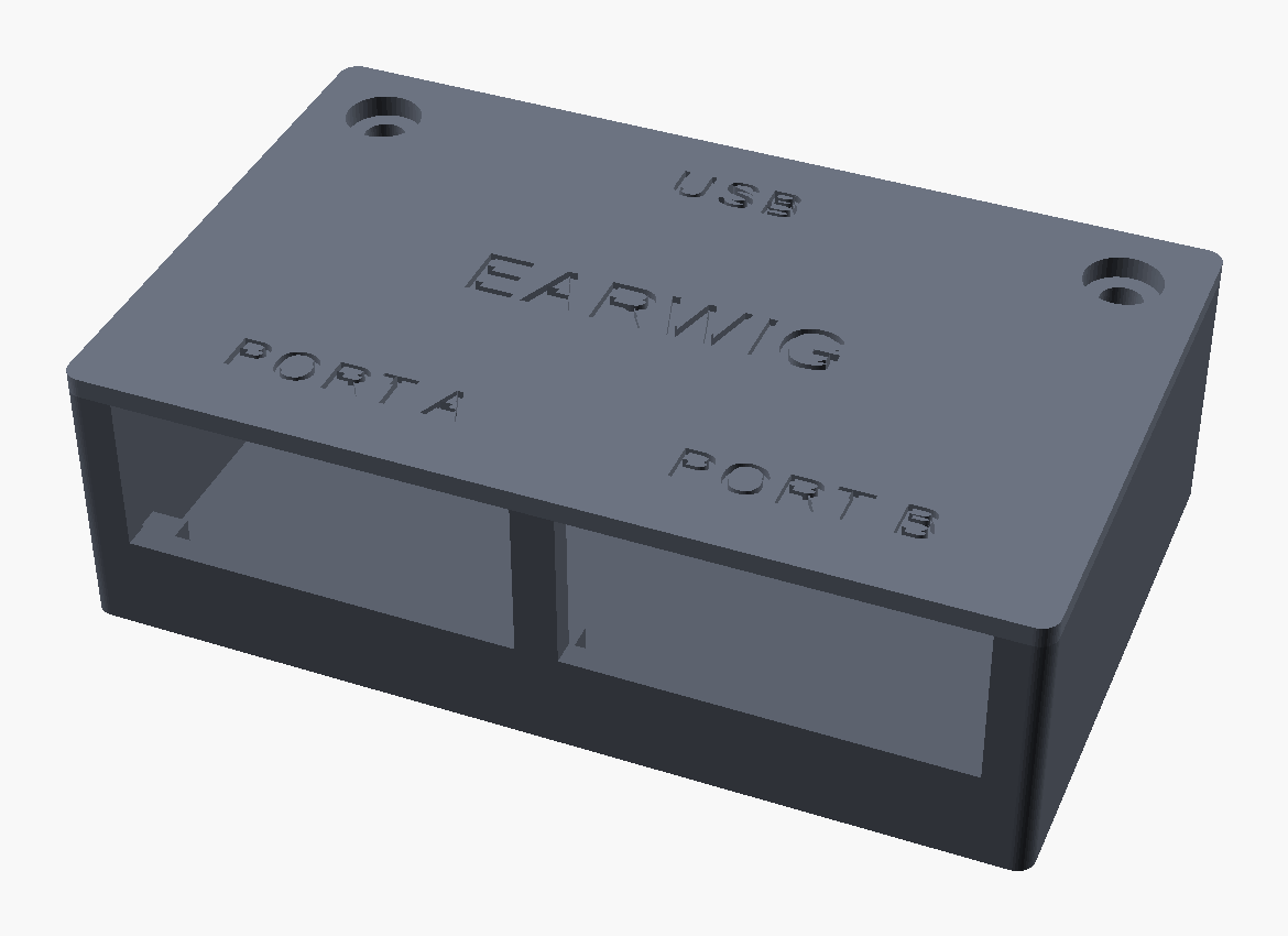 The Earwig adapter: a small dark grey box with two DB9 serial ports on the front and EARWIG engraved on the lid.